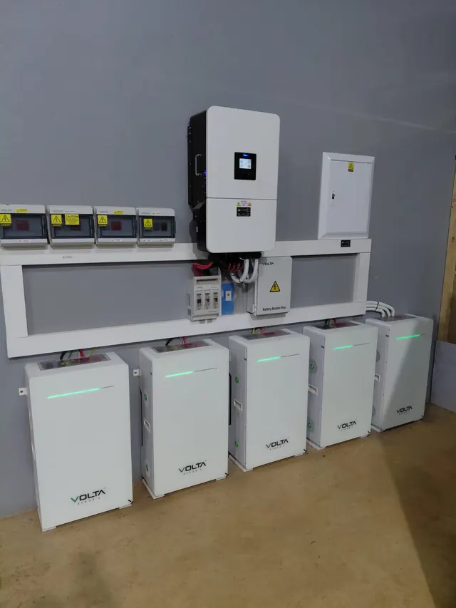 Blinkwater Hardware: A Deye inverter with Volta distribution boards and a row of Volta Stage 4 battery storage units installed for a hardware retail operation.