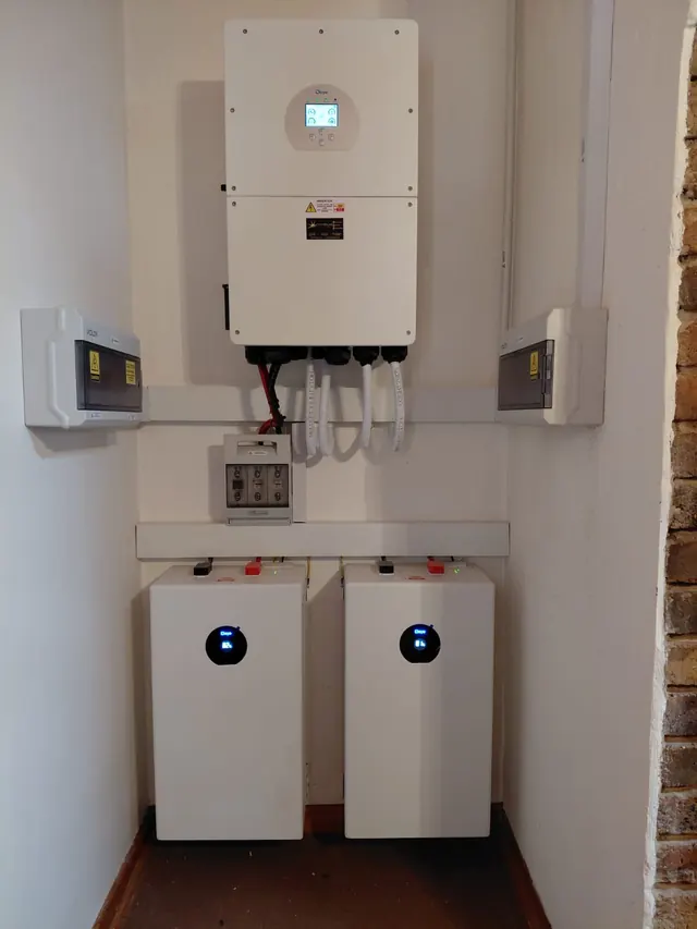 Commercial Installation: A wall-mounted Deye inverter with Volta distribution and battery storage installed for a commercial operation.
